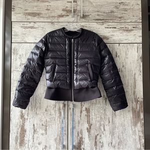 MAJE peplum ruffle Lightweight down jacket in black